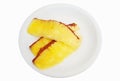 Sliced Ã¢â¬â¹Ã¢â¬â¹grilled pineapple on a white plate after eating to help digest food isolated on white background with clipping path,